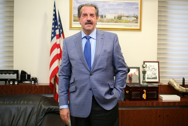 Mr.  Alexander Rovt poses for a photo in his office in Manhattan on June 6, 2014. Mr. Rovt is listed in Forbes magazines in the top 400 wealthiest people living in the United States. (Benjamin Chasteen/Epoch Times)