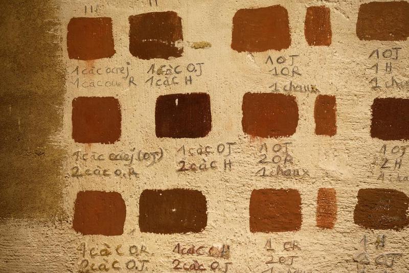 Colour test are seen on a wall of the Chateau de Guedelon.  REUTERS/Jacky Naegelen