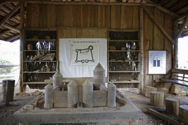 A blue print and a model of the Chateau de Guedelon. REUTERS/Jacky Naegelen