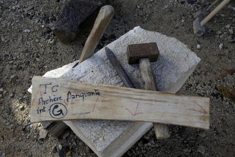 Stonecutters tools are seen at the construction site of the Chateau de Guedelon. REUTERS/Jacky Naegelen