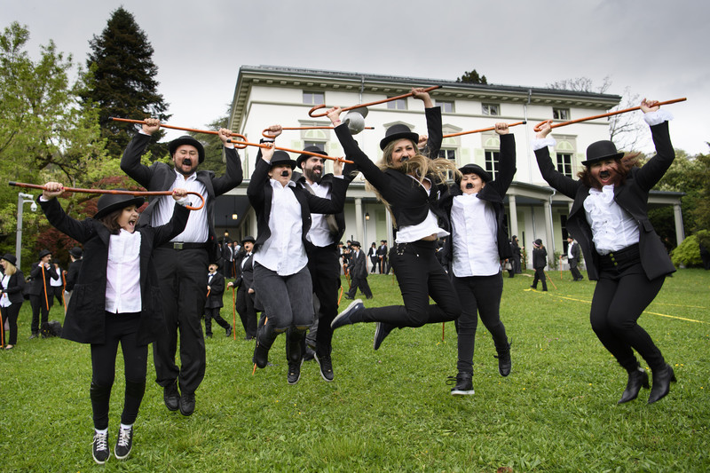 epa05910681 Some 662 people dressed as Charlie Chaplin pose for a group photo in front of the Manoir de Ban during an attempt of the world's largest gathering of people dressed as 'The Tramp' on the occasion of Charlie Chaplin's birthday, and to celebrate the first year of the museum "Chaplin's World by Grevin", in Corsier, above Vevey, Switzerland, 16 April 2017. Chaplin's World, a museum on English comic actor, filmmaker, and composer Charlie Chaplin, is located in a 14 hectare park of lush trees, it occupies the mansion where the Chaplin family lived the last 25 years of Charly Chaplin's life. EPA/LAURENT GILLIERON