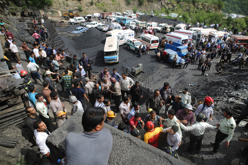 epa05942156 Iranian emergency personnel and mine workers gather around the Azad-Shahr coal mine in the city of Golestan, northern, Iran, 03 May 2017. Media reported that around 80 mine workers got trapped at 1800 meters deep after explosion in the mine. EPA/Masoud Hasanzadeh