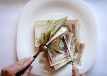 Официально: курс гривни упал почти до 26 за доллар