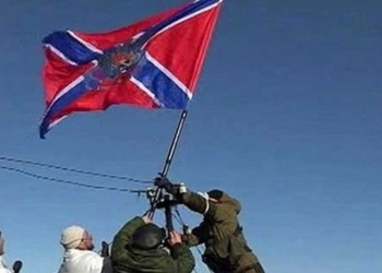 Двое херсонцев с флагом “Новороссии” решили захватить херсонский вокзал