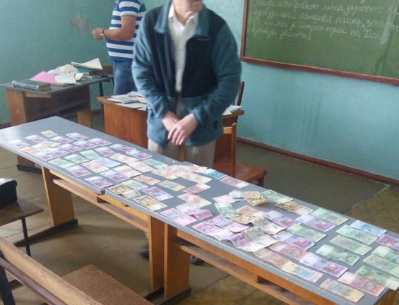 В Николаеве милиция поймала на взятке 76-летнего доцента университета 1