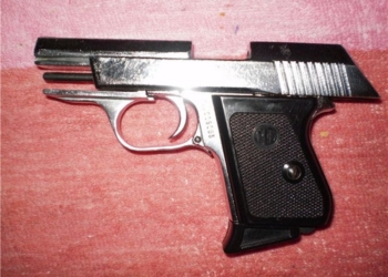 Уже не такой и стартовый: в Николаеве задержали парня с «усовершенствованным» под резинку пистолетом