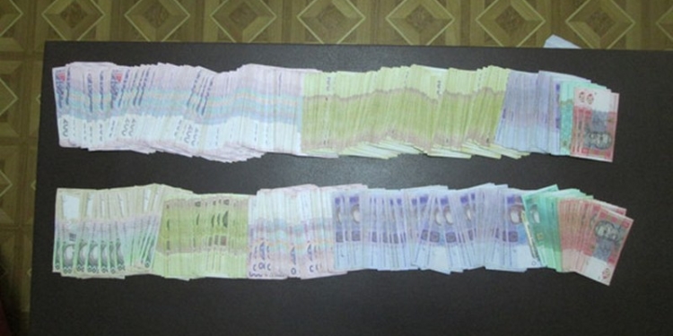 В вузе Николаева задержан коррупционер со 100 тыс.грн. в рюкзаке