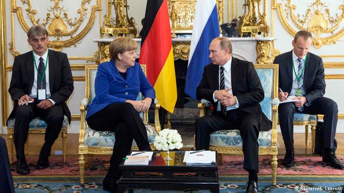 Меркель обсудила с Путиным вопрос размещения миротворцев ООН на Донбассе 1