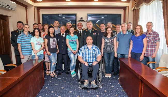 На реабилитацию в Грузию отбыли 15 нацгвардейцев с женами