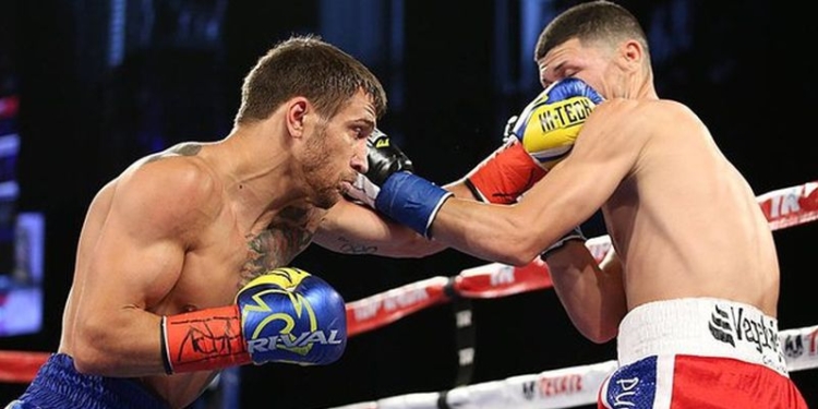 Украинский боксер Ломаченко эффектно добыл чемпионский пояс