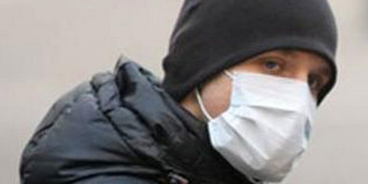 В Николаеве преступник в медицинской маске с пистолетом ограбил кредитное учреждение