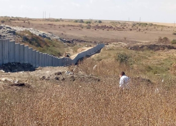 Превращение городской свалки в Николаеве в полигон ТБО: половина забора уже установлена