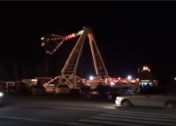 Николаев. Вечер. Визг на площади. Это заработал Луна-парк возле горисполкома