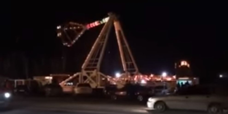 Николаев. Вечер. Визг на площади. Это заработал Луна-парк возле горисполкома