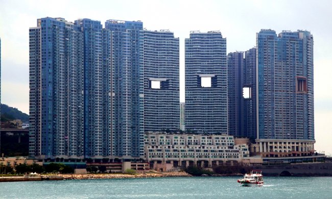Почему в Гонконге новейшие небоскребы усеяны дырами 3