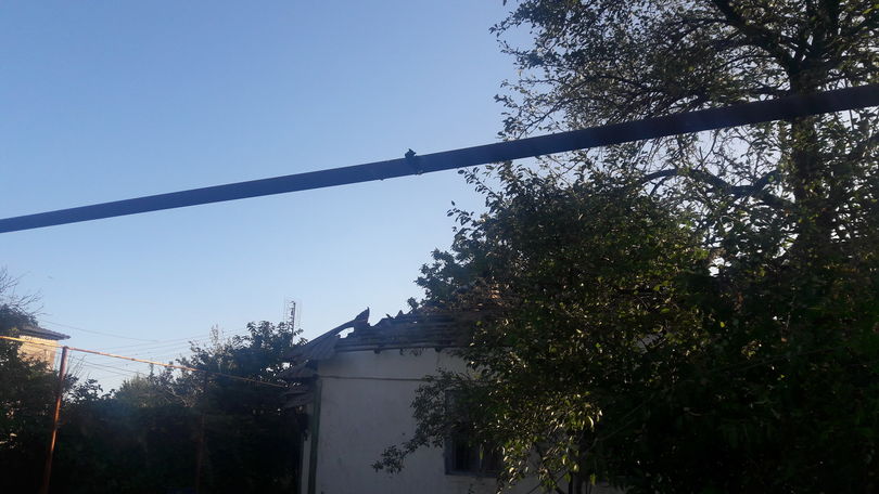 Появились фото последствий обстрела боевиками поселка в Луганской области, где погиб мирный житель 5