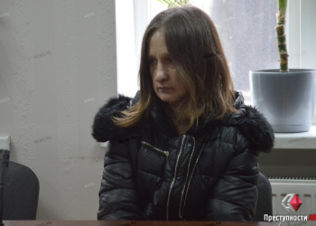 В Николаеве приступили к суду над матерью, которая бросила своего ребенка с моста. Она настаивает, что выпустила его случайно