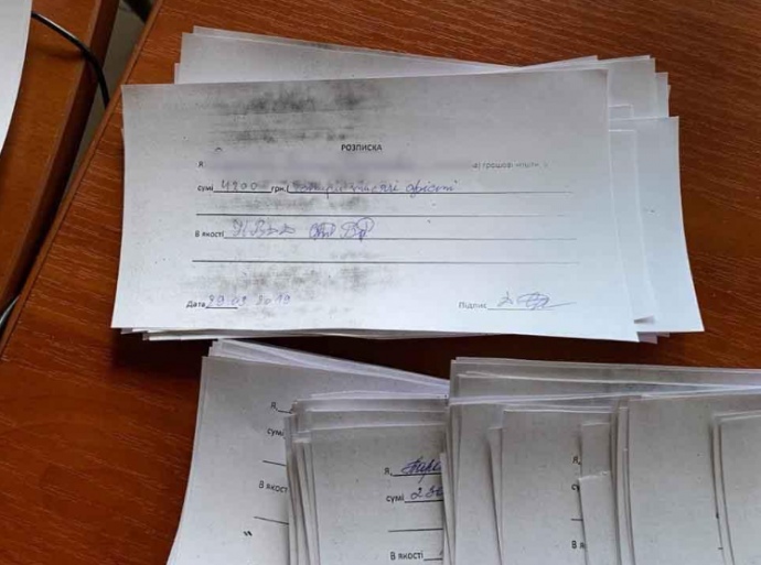 Полиция разоблачила схему подкупа избирателей за "кандидата П" 1