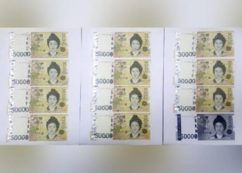 Кореянка случайно разрезала в шредере 550 тысяч вон и склеивала купюры целый месяц