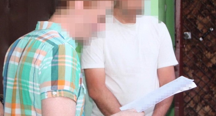 СБУ задержала россиянина за подготовку диверсии на военном аэродроме. У него дома нашли три бомбы (ФОТО)