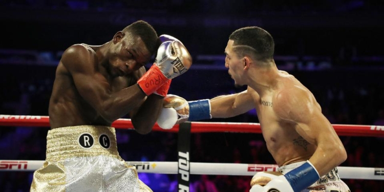 Теофимо Лопес нокаутировал Комми во втором раунде, отобрав титул IBF