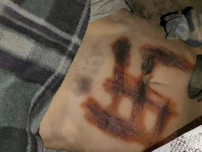 Военные показали тело замученной девушки с вырезанной на животе свастикой (ФОТО)