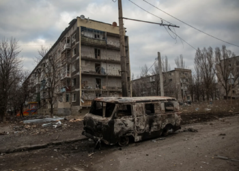 A general view shows an empty street and buildings damaged by a Russian military strike in Bakhmut
