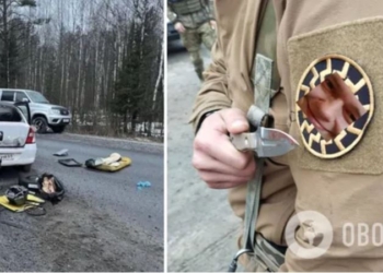 Російський силовик, який затримував нібито терориста з “Крокуса”, засвітив на рукаві неонацистський символ (ФОТО)